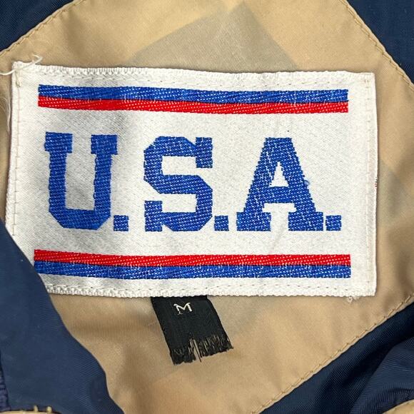 tan puffer vest with navy trim - Picture 4 of 5